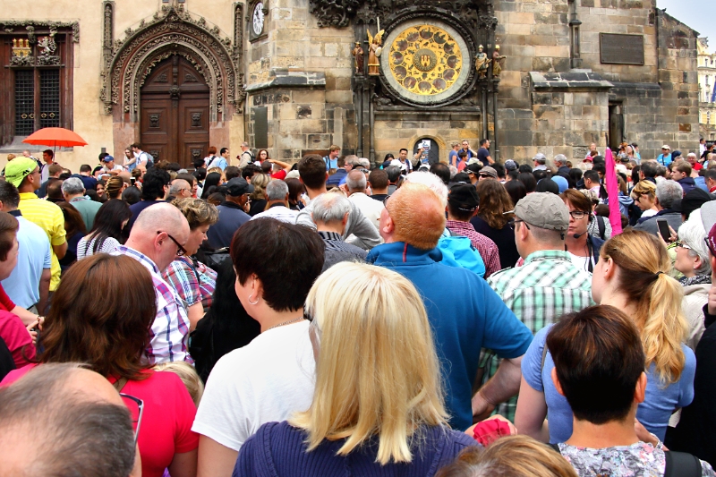 Czech Republic - Prague - Tourist crowds gather every hour to watch the appearance of the 12 Apostles above the Astronomical Clock on the Old Town Hall