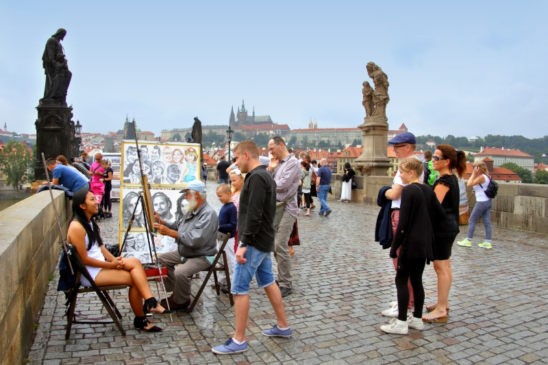 Czech Republic - Prague - Buskers and Artists are common on Charles Bridge