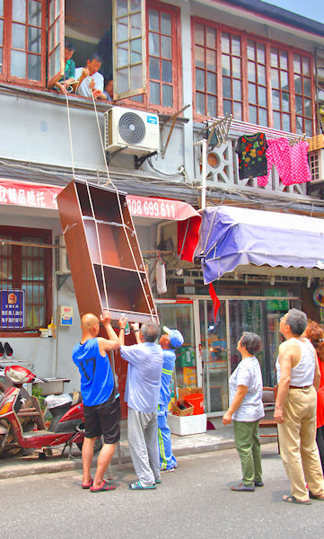 How to get a cupboard to an upstairs room in Shanghai