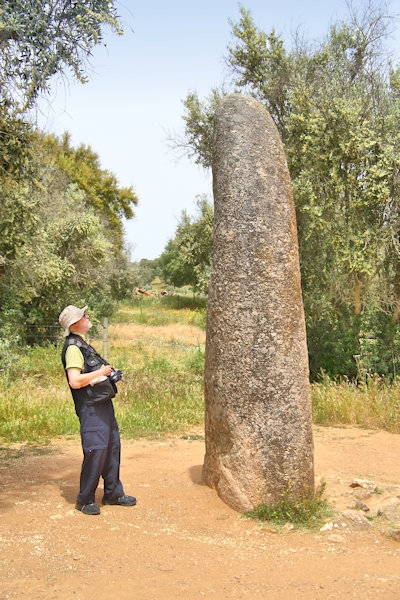 Isolated single menhir of the Almendres Cromlech standing stones, 10 km west of Evora, Portugal