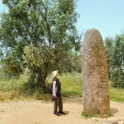 Isolated single menhir of the Almendres Cromlech standing stones, 10 km west of Evora, Portugal