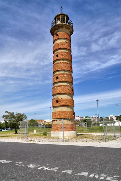 Old lighthouse on the bank of the Tagus River in Belem, Lisbon.