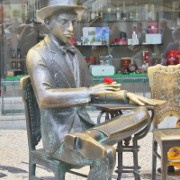 A bronze statue of the 20th century poet Fernando Pessoa, Lisbon.