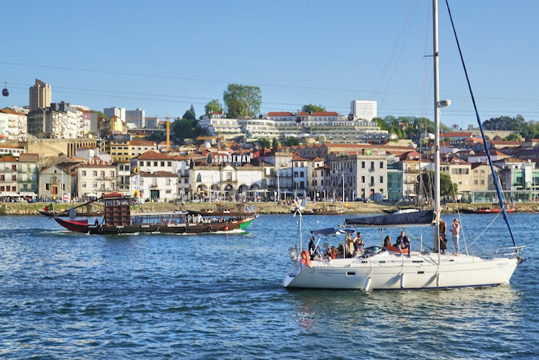 Calem and Sandeman in view across the Douro River are famous for their wine tasting and visits to their cellars