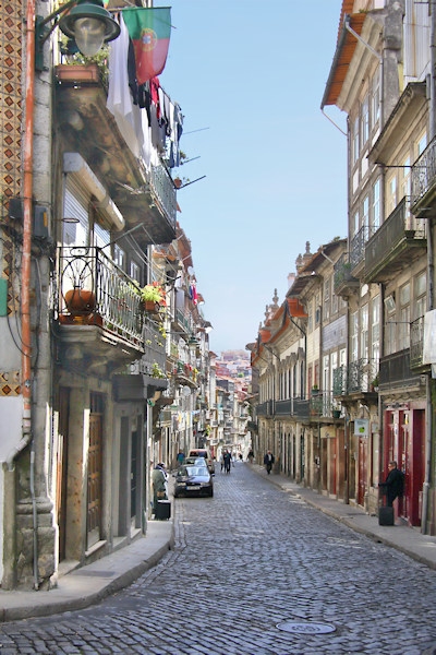  In the old quarter of Porto, Portugal - by the 13th century the city had grown, such that the walls were taken down and  areas along the river like the Ribeira were occupied