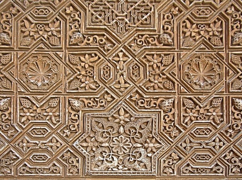 Detail of pattern in the Islamic palaces, Alhambra, Granada, Spain